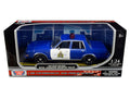 1986 Dodge Diplomat "Royal Canadian Mounted Police" Metallic Blue and White 1/24 Diecast Model Car by Motormax